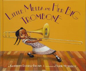 The cover of the picture book Little Melba and Her Big Trombone, which features a Black girl in a dress playing a gold trombone