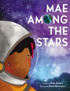 The cover of the picture but Mae Among the Stars, which shows a Black girl in an astronaut helmet looking out at a starry landscape