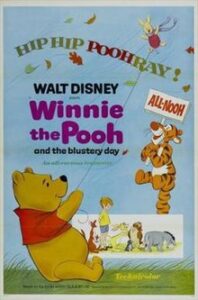 A movie poster of Winnie The Pooh and the Blustery Day, which includes Winnie the Pooh flying a kite with Tigger bouncing in the background