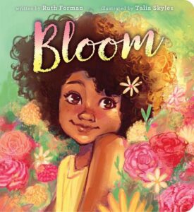 The cover of the picture but Bloom, which features a Black girl with curly hair in a field of flowers