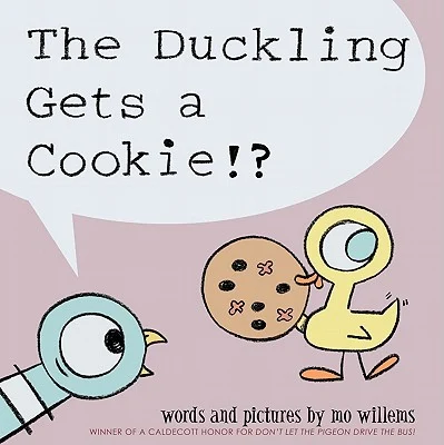 The cover of the book The Duckling Gets a Cookie!? Which includes a cartoon pigeon gaping in horror at a cartoon duckling holding a cookie