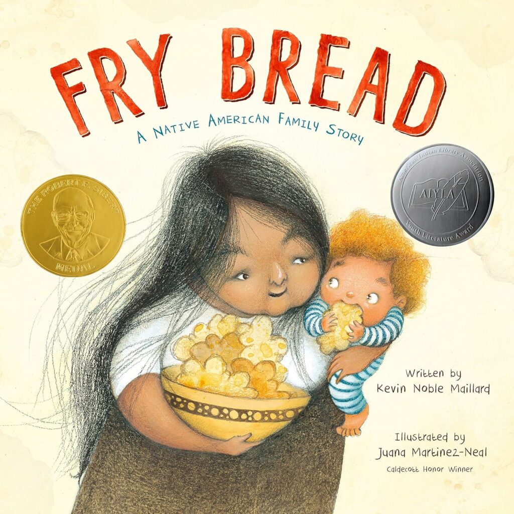 The cover of the book Fry Bread, which includes a Native American woman holding a curly-haired baby and a big bowl of rye bread